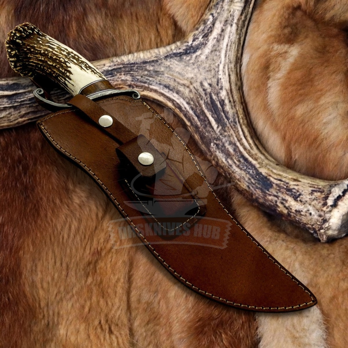 Persian-style Bowie knife shown with its thick brown leather sheath