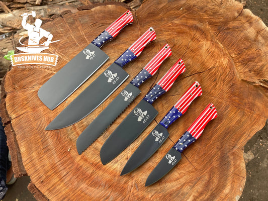 American flag handle knives with engraved portrait, displayed on rustic wood