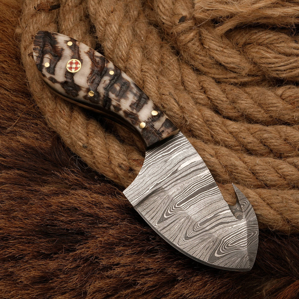 Forged by hand custom made Damascus steel gut hook skinner knife || drs knives hub