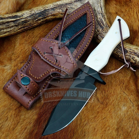 Carbon steel hunting knife with camel bone handle and Damascus blade