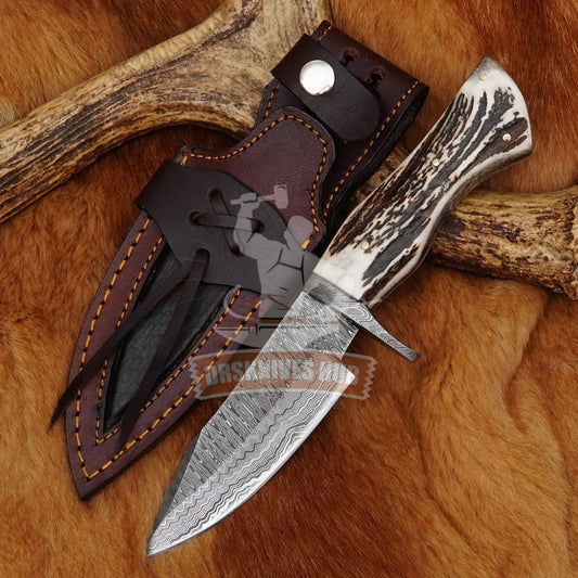 120-layer Damascus hunting knife with antler handle and leather sheath