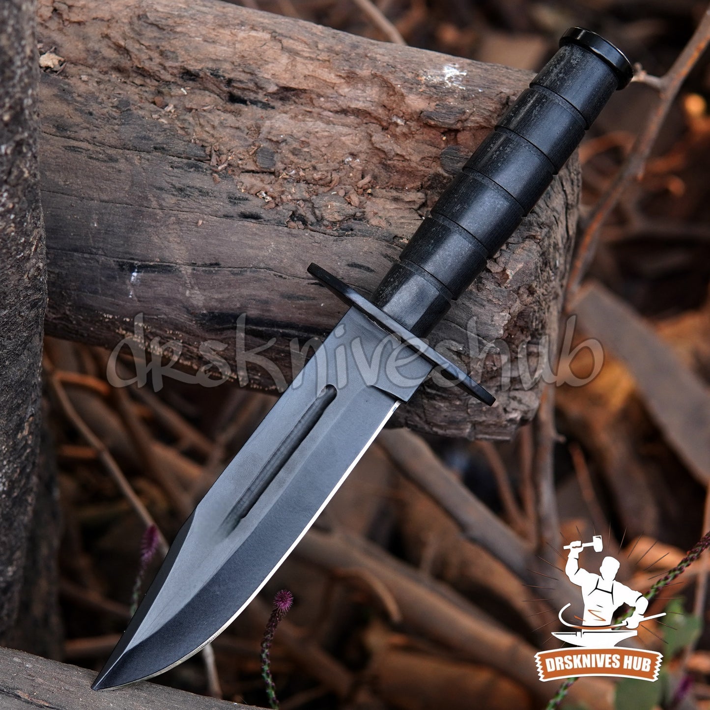 Black knife with sheath on a wooden surface, branded 'drs Knives Hub'.