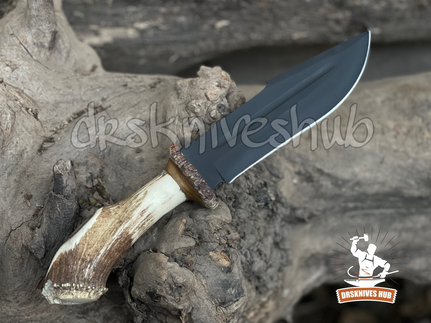 Knife with a wooden handle on a rocky surface, branded 'Drskniveshub'.