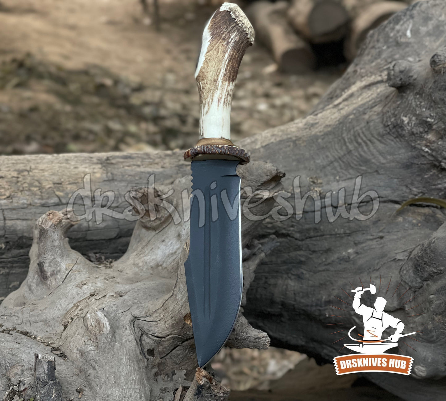 Knife with stag  handle embedded in a log, branded 'Darknives Hub'.