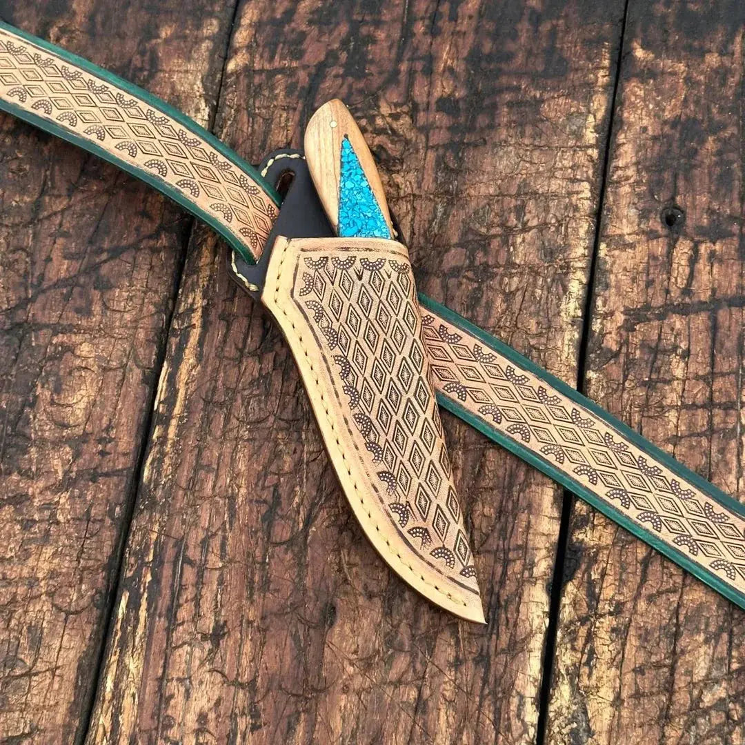 Damascus skinner knife with turquoise wood handle and leather sheath