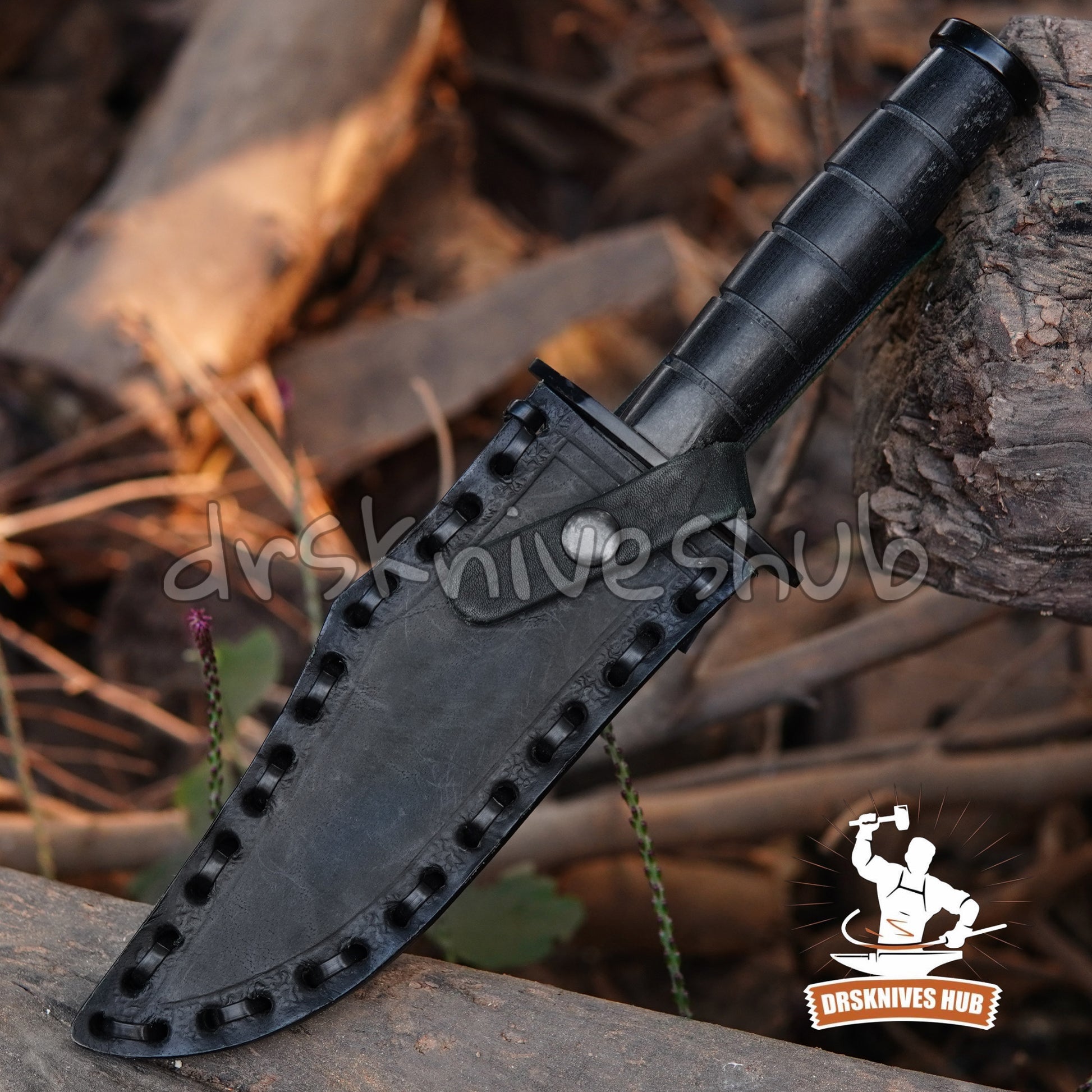 Black knife with a textured handle on a natural background, featuring the Dasknives Hub logo.