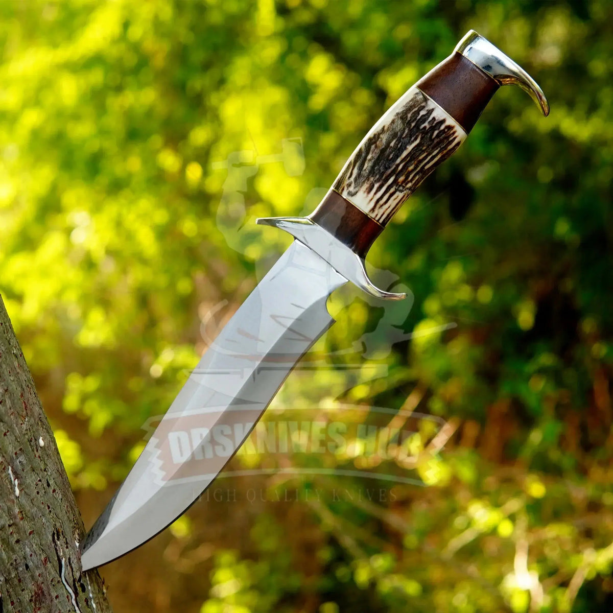 Close-up of D2 steel clip-point Bowie hunting knife blade