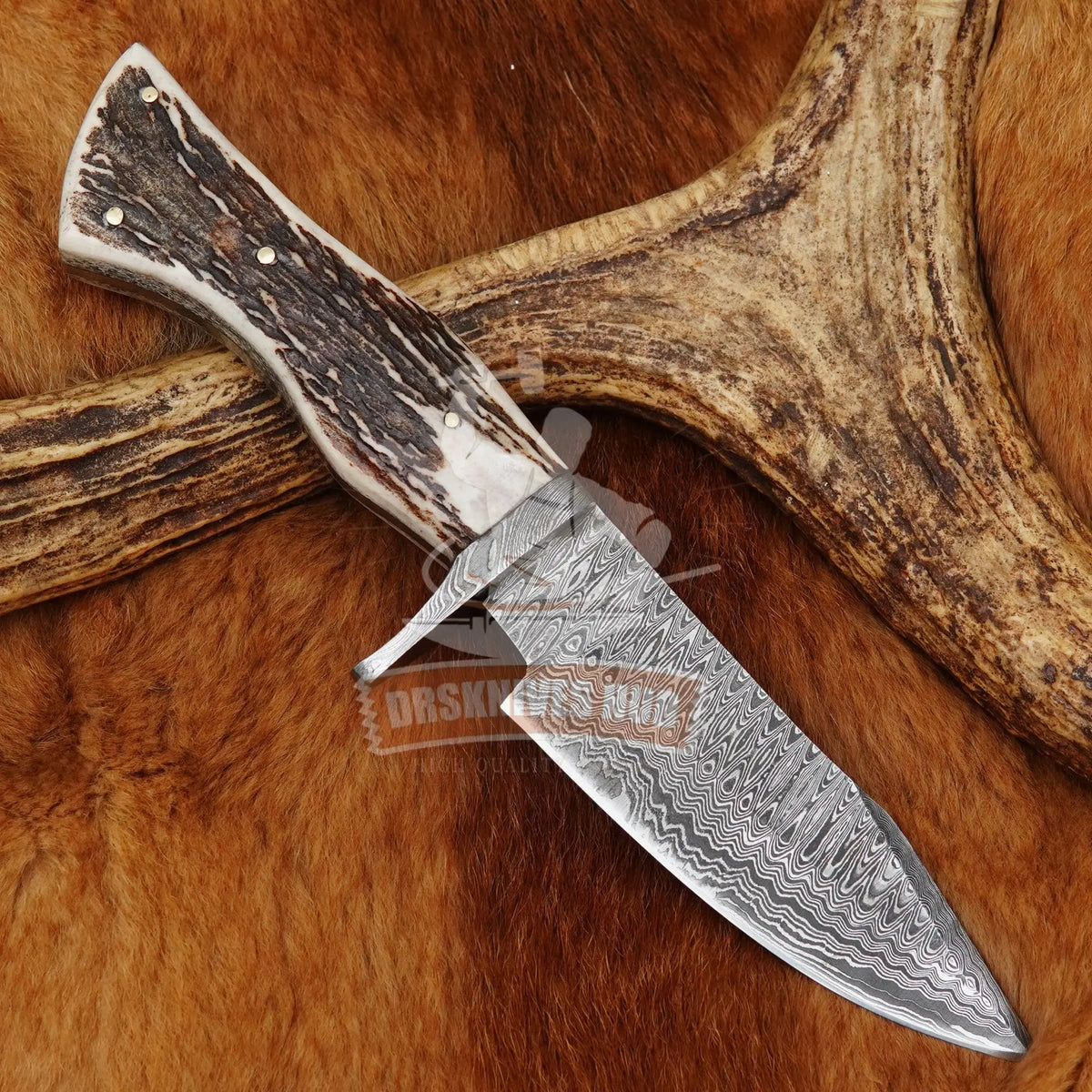 Full-tang Damascus hunting knife with clip-point blade
