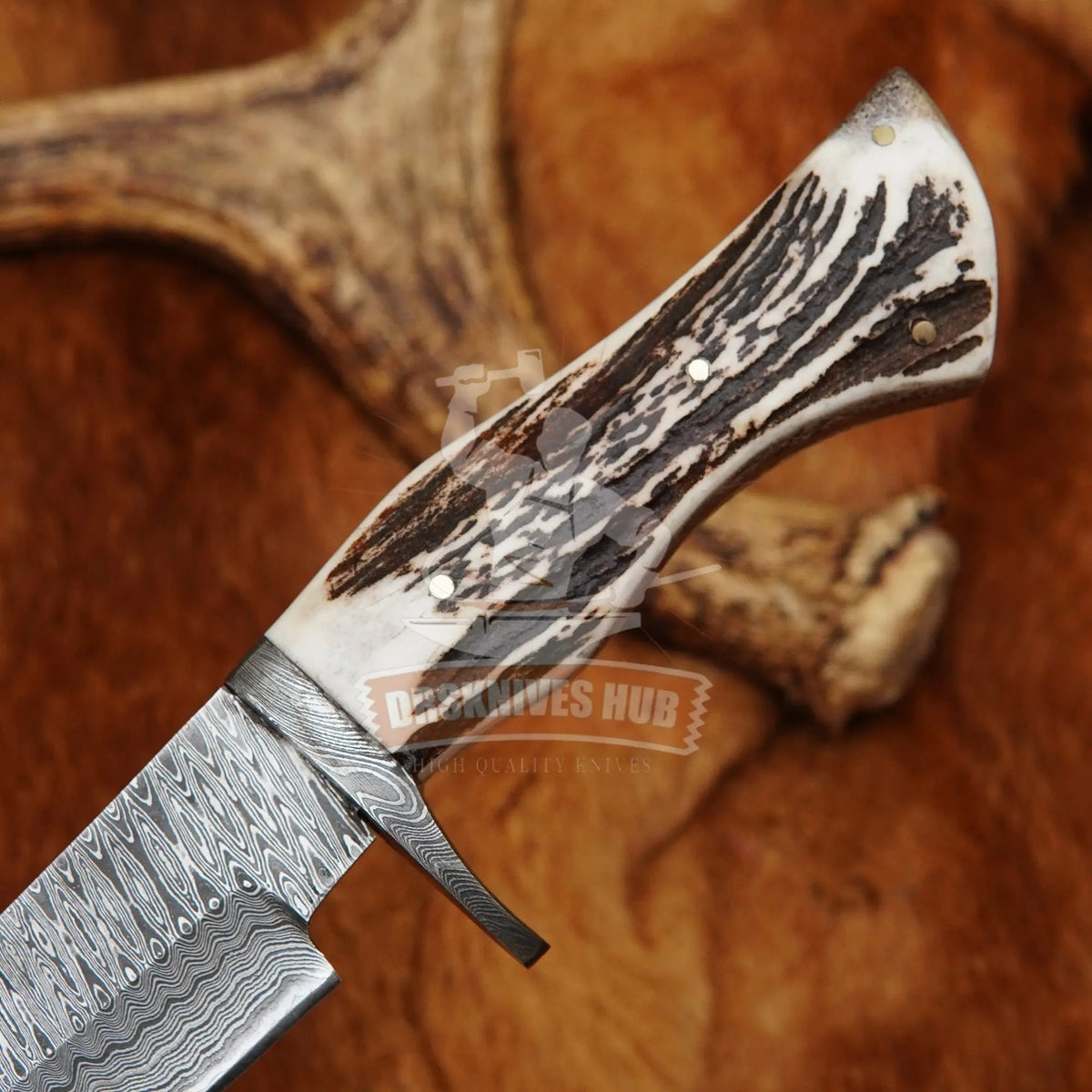 Genuine antler handle on handmade Damascus knife