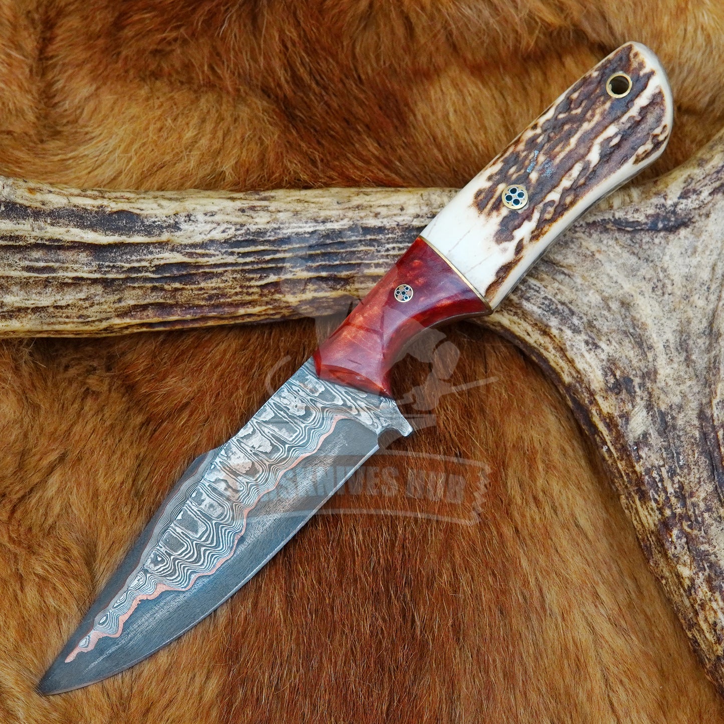 Handmade Damascus hunting knife with stag and resin handle and leather sheath